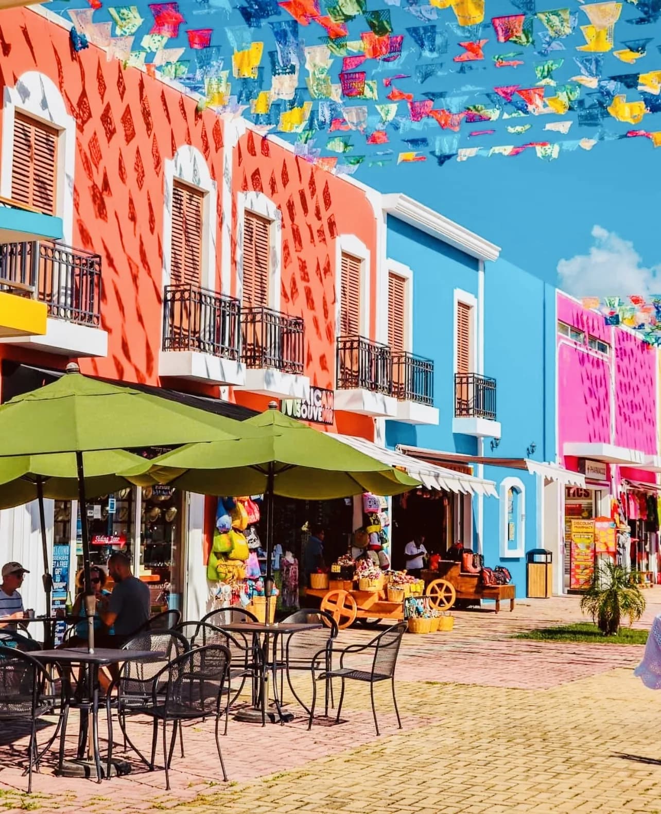 Colorful papel picado flags in downtown Cozumel - news and updates